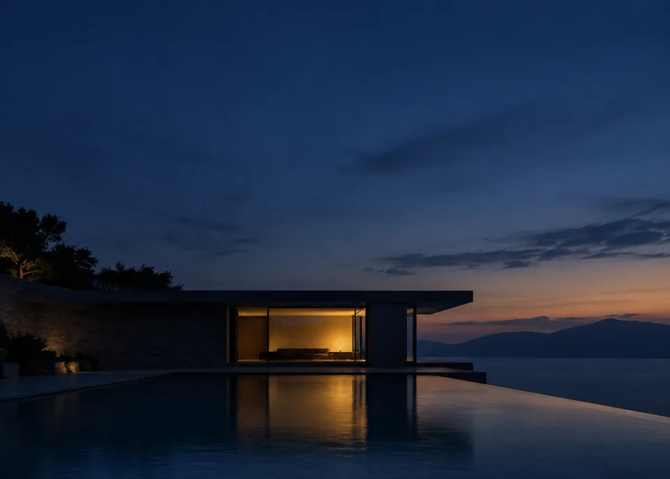 Last Light: A low modern building silhouette in lower third under large smooth navy twilight sky, one broad muted warm window glow, still dark foreground and no small details.