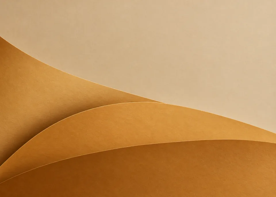 Ochre Fan: Three immense broad warm ochre paper planes softly fan out from outside bottom-left edge, no thin pleating, calm muted tan upper background.